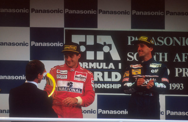 1993 South African Grand Prix.
Kyalami, South Africa.
12-14 March 1993.
Ayrton Senna (McLaren Ford) 2nd position and Alain Prost (Williams Renault) 1st position on the podium.
Ref-93 SA 05.
World Copyright - LAT Photographic

