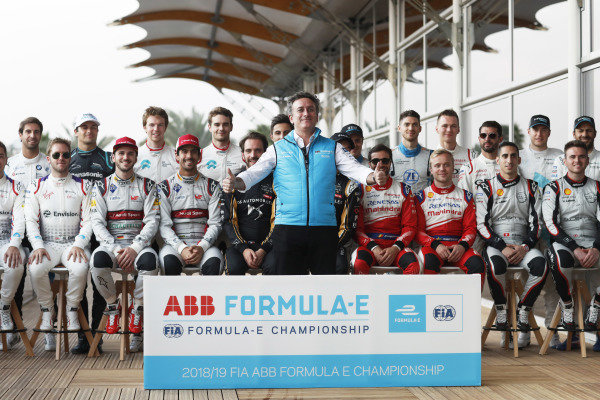 Alejandro Agag, CEO, Formula E, poses for a photo with the drivers