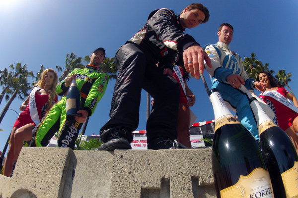 13-15 April, 2012, Long Beach, California, USA
James Hinchcliffe, Will Power and Simon Pagenaud prepare to celebrate their victory with champagne
(c)2012, Lesley Ann Miller
LAT Photo USA