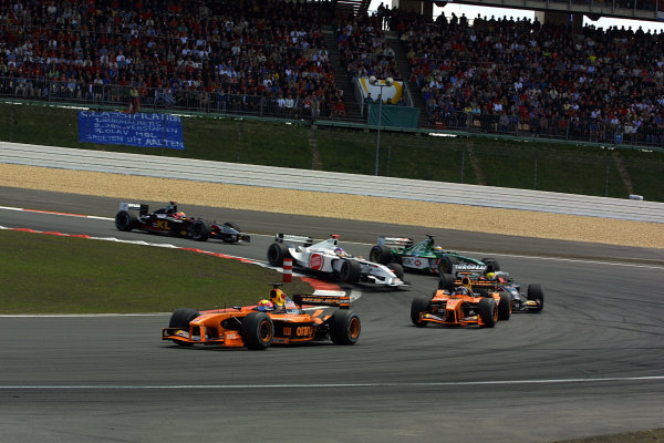 2002 European Grand Prix - Sunday Race
Nurburgring, Germany. 23rd June 2002.
Enrique Bernoldi, Arrows Cosworth A23, leads team mate Heinz-Harald Frentzen, at the start of the race.
World Copyright: LAT Photographic.
ref: Digital Image Only

