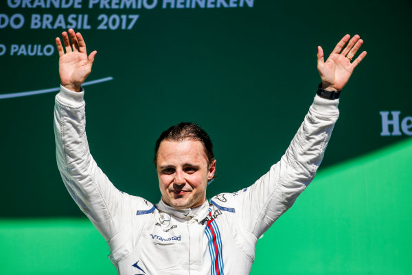 Interlagos, Sao Paulo, Brazil.
Sunday 12 November 2017.
Felipe Massa, Williams Martini Racing, waves from the podium whilst celebrating after his final home Grand Prix.
World Copyright: Charles Coates/LAT Images 
ref: Digital Image AN7T7564