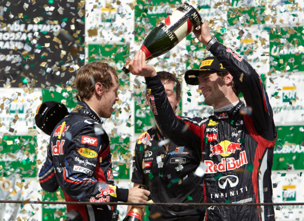 Interlagos, Sao Paulo, Brazil.
27th November 2011.
Sebastian Vettel, Red Bull Racing RB7 Renault, 2nd position, and Mark Webber, Red Bull Racing RB7 Renault, 1st position, celebrate on the podium with Champagne. Portrait. Podium.
World Copyright: Steve Etherington/LAT Photographic
ref: Digital Image SNE28373 Interlagos, Sao Paulo, Brazil.
27th November 2011.
Sebastian Vettel, Red Bull Racing RB7 Renault, 2nd position, and Mark Webber, Red Bull Racing RB7 Renault, 1st position, celebrate on the podium with Champagne. Portrait. Podium.
World Copyright: Steve Etherington/LAT Photographic
ref: Digital Image SNE28373