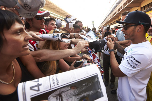 Circuit de Catalunya, Barcelona, Spain.
Thursday 8 May 2014.
Lewis Hamilton, Mercedes AMG, signs autographs for fans.
World Copyright: Steve EtheringtonLAT Photographic.
ref: Digital Image SNE11750 copy Circuit de Catalunya, Barcelona, Spain.
Thursday 8 May 2014.
Lewis Hamilton, Mercedes AMG, signs autographs for fans.
World Copyright: Steve EtheringtonLAT Photographic.
ref: Digital Image SNE11750 copy