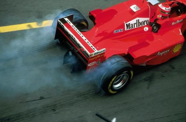 Eddie Irvine (GBR) Ferrari F300 smokes his tyres as he leaves the pits after his pitstop.
Formula One World Championship, Rd3, Argentine Grand Prix, Buenos Aires, Argentina, 12 April 1998.
BEST IMAGE