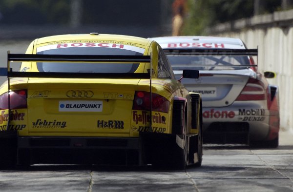 2002 DTM Championship 
Norisring, Germany. 29th - 30th June 2002. 
Race winner Laurent Aiello (Abt Audi TT-R) chases 2nd placed finisher Bernd Schneider (HWA Mercedes), action.
World Copyright: Andre Irlmeier/LAT Photographic



