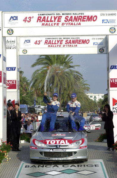 2001 World Rally Championship
Rallye Sanremo, Italy. 4-7 October 2001.
Herve and Gilles Panizzi celebrate their win with champagne.
Photo: Ralph Hardwick/LAT