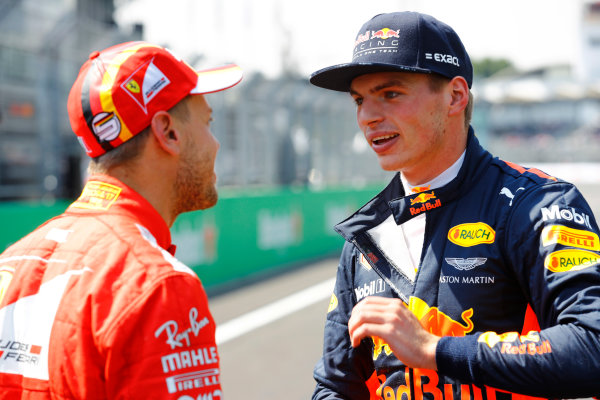 Autodromo Hermanos Rodriguez, Mexico City, Mexico.
Saturday 28 October 2017.
Pole winner Sebastian Vettel, Ferrari, talks to second-qualifer Max Verstappen, Red Bull Racing, 
World Copyright: Steven Tee/LAT Images 
ref: Digital Image _R3I5444