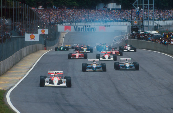 1991 Brazilian Grand Prix.
Interlagos, Sao Paulo, Brazil.
22-24 March 1991.
Ayrton Senna (McLaren MP4/6 Honda) leads Nigel Mansell, Riccardo Patrese (both Williams FW14 Renault's), Gerhard Berger (McLaren MP4/6 Honda), Jean Alesi and Alain Prost (Ferrari 642) at the start.
Ref-91 BRA 01.
World Copyright - LAT Photographic

