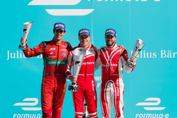 2016/2017 FIA Formula E Championship.
Round 7 - Berlin ePrix, Tempelhof Airport, Berlin, Germany.
Saturday 10 June 2017.
Lucas Di Grassi (BRA), ABT Schaeffler Audi Sport, Spark-Abt Sportsline, ABT Schaeffler FE02, Felix Rosenqvist (SWE), Mahindra Racing, Spark-Mahindra, Mahindra M3ELECTRO, and Nick Heidfeld (GER), Mahindra Racing, Spark-Mahindra, Mahindra M3ELECTRO, on the podium.
Photo: Zak Mauger/LAT/Formula E
ref: Digital Image _54I7679 2016/2017 FIA Formula E Championship.
Round 7 - Berlin ePrix, Tempelhof Airport, Berlin, Germany.
Saturday 10 June 2017.
Lucas Di Grassi (BRA), ABT Schaeffler Audi Sport, Spark-Abt Sportsline, ABT Schaeffler FE02, Felix Rosenqvist (SWE), Mahindra Racing, Spark-Mahindra, Mahindra M3ELECTRO, and Nick Heidfeld (GER), Mahindra Racing, Spark-Mahindra, Mahindra M3ELECTRO, on the podium.
Photo: Zak Mauger/LAT/Formula E
ref: Digital Image _54I7679