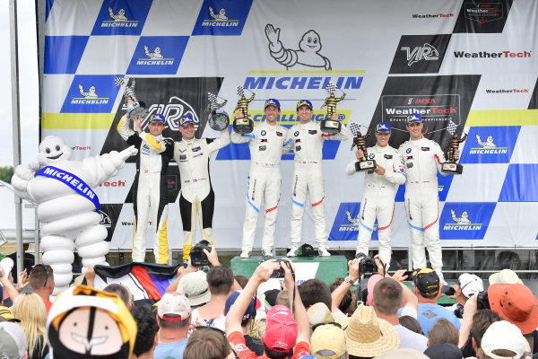 #25 BMW Team RLL BMW M8, GTLM: Alexander Sims, Connor de Phillippi, #3 Corvette Racing Chevrolet Corvette C7.R, GTLM: Antonio Garcia, Jan Magnussen, #24 BMW Team RLL BMW M8 GTLM: John Edwards, Jesse Krohn celebrate the win on the podium