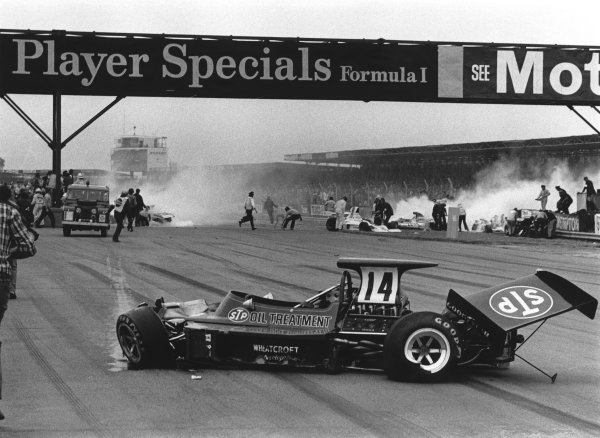 1973 British Grand Prix.
Silverstone, England.
12-14 July 1973.
Jody Scheckter (McLaren M23 Ford) causes a multiple pile-up at the end of lap 1. Amazingly only Andrea de Adamich was injured.In the foreground, the wreckage of Roger Williamson's March 731-Ford. Action.
World Copyright - LAT Photographic



