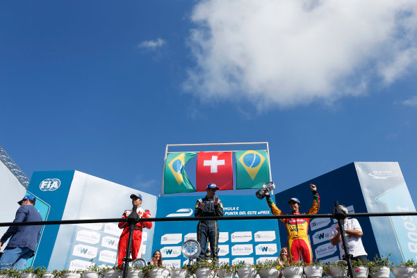 2014 FIA Formula E Championship.
Punta del Este ePrix, Uruguay.
Podium. Sebastien Buemi (SWI)/E.dams Renault - Spark-Renault SRT_01E (first position), Nelson Piquet Jr (BRA)/China Racing - Spark-Renault SRT_01E (second position) and Lucas di Grassi (BRA)/Audi Abt Sport - Spark-Renault SRT_01E (third position).
Photo: Zak Mauger/LAT/FE
ref: Digital Image _L0U1957 2014 FIA Formula E Championship.
Punta del Este ePrix, Uruguay.
Podium. Sebastien Buemi (SWI)/E.dams Renault - Spark-Renault SRT_01E (first position), Nelson Piquet Jr (BRA)/China Racing - Spark-Renault SRT_01E (second position) and Lucas di Grassi (BRA)/Audi Abt Sport - Spark-Renault SRT_01E (third position).
Photo: Zak Mauger/LAT/FE
ref: Digital Image _L0U1957