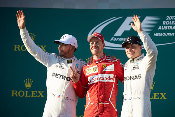 Albert Park, Melbourne, Australia.
Sunday 26 March 2017.
Lewis Hamilton, Mercedes AMG, 2nd Position, Sebastian Vettel, Ferrari, 1st Position, and Valtteri Bottas, Mercedes AMG, 3rd Position, on the podium.
World Copyright: Steve Etherington/LAT Images
ref: Digital Image SNE25438