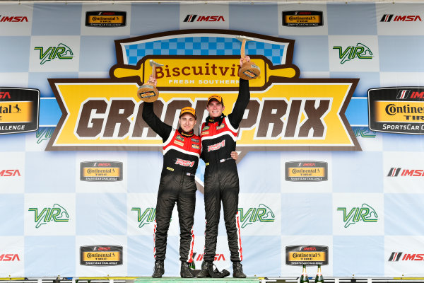 IMSA Continental Tire SportsCar Challenge
Biscuitville Grand Prix
Virginia International Raceway, Alton, VA USA
Saturday 26 August 2017
28, Porsche, Porsche Cayman GT4, GS, Dylan Murcott, Dillon Machavern celebrate the win in victory lane on the podium
World Copyright: Scott R LePage
LAT Images IMSA Continental Tire SportsCar Challenge
Biscuitville Grand Prix
Virginia International Raceway, Alton, VA USA
Saturday 26 August 2017
28, Porsche, Porsche Cayman GT4, GS, Dylan Murcott, Dillon Machavern celebrate the win in victory lane on the podium
World Copyright: Scott R LePage
LAT Images