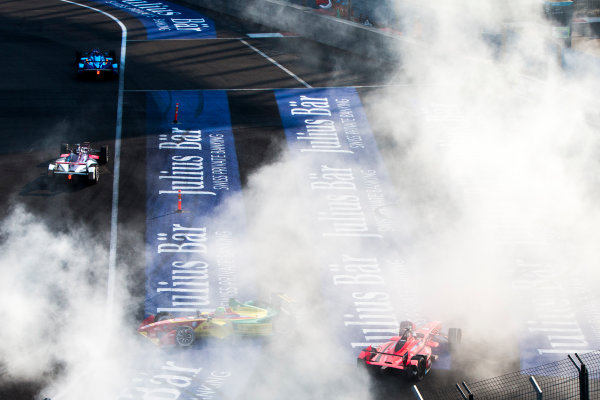 2015/2016 FIA Formula E Championship.
Mexico City ePrix, Autodromo Hermanos Rodriguez, Mexico City, Mexico.
Saturday 12 March 2016.
Lucas Di Grassi (BRA), ABT Audi Sport FE01 and Jerome D'Ambrosio (FRA) Dragon Racing - Venturi VM200-FE-01 celebrate by performing donuts for the crowds.
Photo: Zak Mauger/LAT/Formula E
ref: Digital Image _79P3816