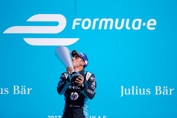 2016/2017 FIA Formula E Championship.
Round 8 - Berlin ePrix, Tempelhof Airport, Berlin, Germany.
Sunday 11 June 2017.
Sebastien Buemi (SUI), Renault e.Dams, Spark-Renault, Renault Z.E 16, celebrates on the podium.
Photo: Alastair Staley/LAT/Formula E
ref: Digital Image _X0W1760