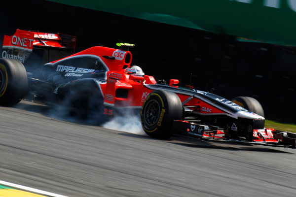 Interlagos, Sao Paulo, Brazil.
25th November 2011.
Jerome d'Ambrosio, Virgin MVR-02 Cosworth locks a brake. Action.
World Copyright:Steven Tee/LAT Photographic
ref: Digital Image _A8C7836