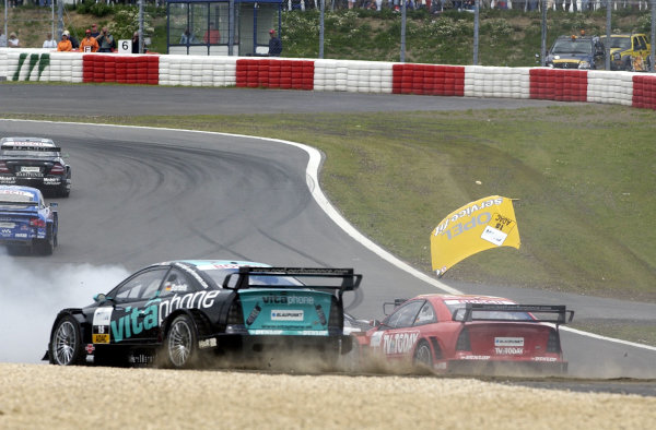 2002 DTM Championship 
Nurburgring, Germany. 2th - 4th August 2002. 
Michael Bartels (Opel Astra V8 Coupe) and Joachim Winkelhock run wide to avoid the collision between Jean Alesi and Alain Menu.
World Copyright: Andre Irlmeier/LAT Photographic

