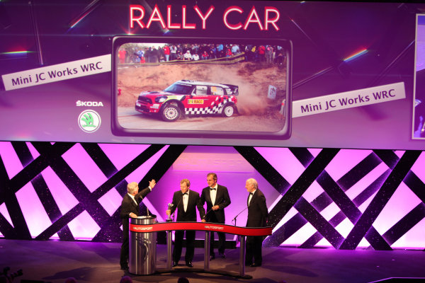 Grosvenor House Hotel, Park Lane, London 
4th December 2011 
David Richards and Dr Kay Segler accept the Rally Car of the Year award on behalf of the Mini John Cooper Works WRC from Carlos Sainz on the stage.
World Copyright: Glenn Dunbar/LAT Photographic 
ref: Digtal Image GD5D0287