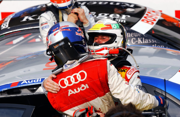 2004 DTM Championship 
Brno,Czech Republic. 18th - 19th September.
Tom Kristensen (Abt Sportsline Audi A4) congratulates winning team mate Mattias Ekstrom (Abt Sportsline Audi A4) after the race.
World Copyright: Andre Irlmeier/LAT Photographic 
ref: Digital Image Only