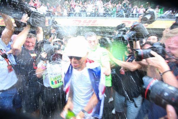 Autodromo Hermanos Rodriguez, Mexico City, Mexico.
Sunday 29 October 2017.
Lewis Hamilton, Mercedes AMG, sprays Champagne at photographers in celebration of securing his 4th world drivers championship title.
World Copyright: Charles Coates/LAT Images
ref: Digital Image DJ5R7724 Autodromo Hermanos Rodriguez, Mexico City, Mexico.
Sunday 29 October 2017.
Lewis Hamilton, Mercedes AMG, sprays Champagne at photographers in celebration of securing his 4th world drivers championship title.
World Copyright: Charles Coates/LAT Images
ref: Digital Image DJ5R7724