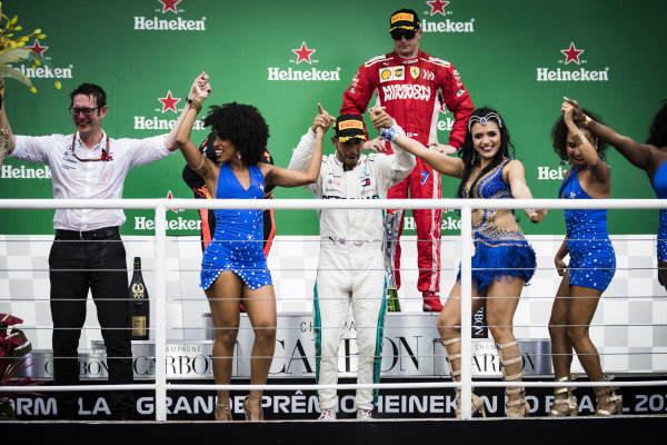 Lewis Hamilton, Mercedes AMG F1, 1st position, celebrates with Samba dancers on the podium