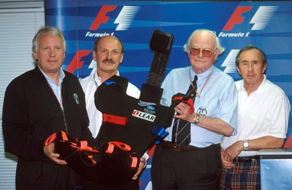 The new 1999 extractable safety seat, designed by LEAR, was on display in Japan with (L to R): Charlie Whiting (GBR) FIA Safety Delegate, a LEAR representative, Doctor Syd Watkins (GBR) FIA Doctor and former World Champion and safety campaigner Jackie Stewart (GBR) Stewart Team Principal.
Formula One World Championship, Japanese GP, Rd 16, Suzuka, Japan, 1 November 1998. The new 1999 extractable safety seat, designed by LEAR, was on display in Japan with (L to R): Charlie Whiting (GBR) FIA Safety Delegate, a LEAR representative, Doctor Syd Watkins (GBR) FIA Doctor and former World Champion and safety campaigner Jackie Stewart (GBR) Stewart Team Principal.
Formula One World Championship, Japanese GP, Rd 16, Suzuka, Japan, 1 November 1998.