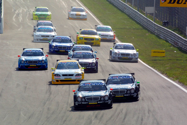 2001 DTM Championship
Zandvoort, Holland. 22nd - 23rd September 2001.
Eventual race winner Uwe Alzen (Warsteiner AMG Mercedes) leads team mate Marcel Fassler, at the start of the race.
World Copyright: Peter Spinney/LAT Photographic
ref: 8
5mb Digital Image Only 2001 DTM Championship
Zandvoort, Holland. 22nd - 23rd September 2001.
Eventual race winner Uwe Alzen (Warsteiner AMG Mercedes) leads team mate Marcel Fassler, at the start of the race.
World Copyright: Peter Spinney/LAT Photographic
ref: 8
5mb Digital Image Only