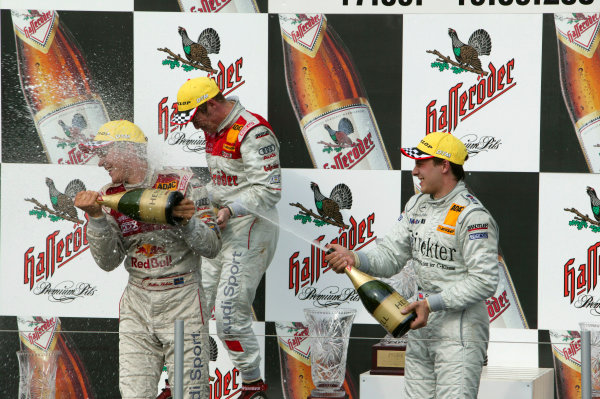 2004 DTM Championship.
Brno, Czech Repulic. 18th - 19th September
Mattias Ekstrom (Abt Sportsline Audi A4) celebrates wining he 2004 DTM Championship with Tom Kristensen (Abt Sportsline Audi A4) and Gary Paffet (HWA Mercedes C-Class).
World Copyright: Andre Irlmeier/LAT Photographic
Ref:Digital image only