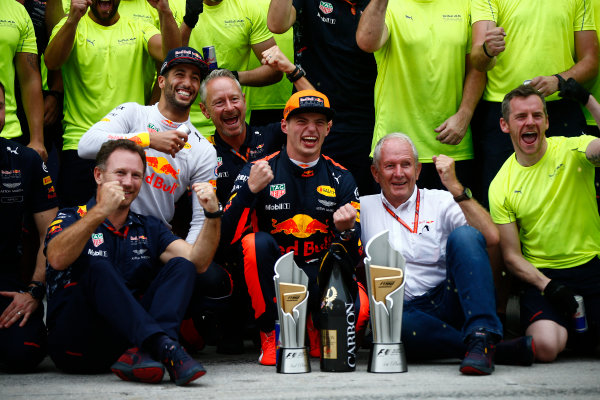 Sepang International Circuit, Sepang, Malaysia.
Sunday 1 October 2017.
Max Verstappen, Red Bull, 1st Position, Daniel Ricciardo, Red Bull Racing, 3rd Position, Christian Horner, Team Principal, Red Bull Racing, Helmut Markko, Consultant, Red Bull Racing, and the Red Bull team celebrate.
World Copyright: Andrew Hone/LAT Images 
ref: Digital Image _ONZ0511