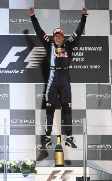 Yas Marina Circuit, Abu Dhabi, United Arab Emirates
1st November 2009.
Sebastian Vettel, Red Bull Racing RB5 Renault, 1st position, celebrates on the podium. Portrait. Podium. 
World Copyright: Steve Etherington/LAT Photographic
ref: Digital Image SNE17926