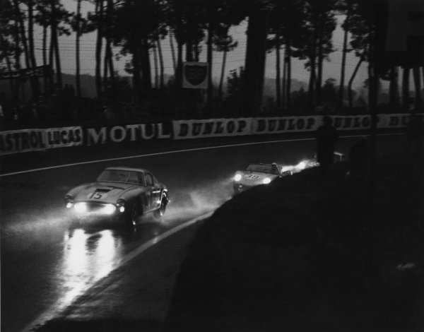 Le Mans, France. 25th - 26th June 1960
Graham Whitehead/Henry Taylor (Ferrari 250 GT0, retired, leads Edgar Barth/Wolfgang Seidel (Porsche RS60), 11th position, at night action. World Copyright: LAT Photographic
Ref: Autocar Used Pic 1st position, July 1960 Pg 10. Le Mans, France. 25th - 26th June 1960
Graham Whitehead/Henry Taylor (Ferrari 250 GT0, retired, leads Edgar Barth/Wolfgang Seidel (Porsche RS60), 11th position, at night action. World Copyright: LAT Photographic
Ref: Autocar Used Pic 1st position, July 1960 Pg 10.