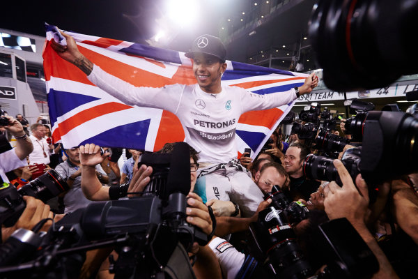 Yas Marina Circuit, Abu Dhabi, United Arab Emirates.
Sunday 23 November 2014.
Lewis Hamilton, Mercedes AMG, celebrates championship victory.
World Copyright: Steve Etherington/LAT Photographic.
ref: Digital Image SNE13425 Yas Marina Circuit, Abu Dhabi, United Arab Emirates.
Sunday 23 November 2014.
Lewis Hamilton, Mercedes AMG, celebrates championship victory.
World Copyright: Steve Etherington/LAT Photographic.
ref: Digital Image SNE13425