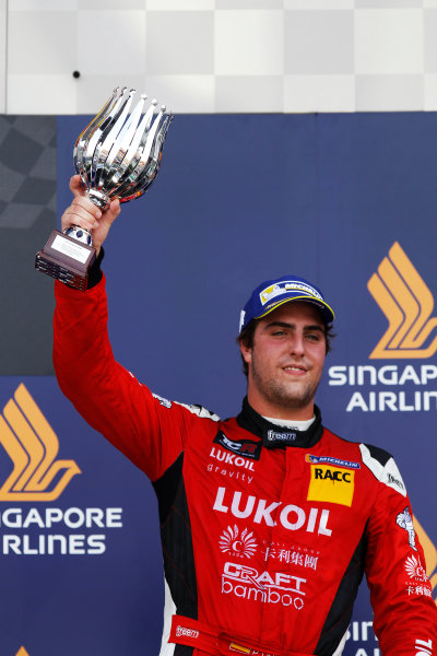 2015 TCR International Series Round 9.
Marina Bay Circuit, Singapore.
Sunday 20 September 2015.
Pepe Oriola, No.74 Team Craft-Bamboo LUKOIL, lifts his trophy on the podium.
World Copyright: Sam Bloxham/LAT Photographic.
ref: Digital Image _G7C4019 2015 TCR International Series Round 9.
Marina Bay Circuit, Singapore.
Sunday 20 September 2015.
Pepe Oriola, No.74 Team Craft-Bamboo LUKOIL, lifts his trophy on the podium.
World Copyright: Sam Bloxham/LAT Photographic.
ref: Digital Image _G7C4019