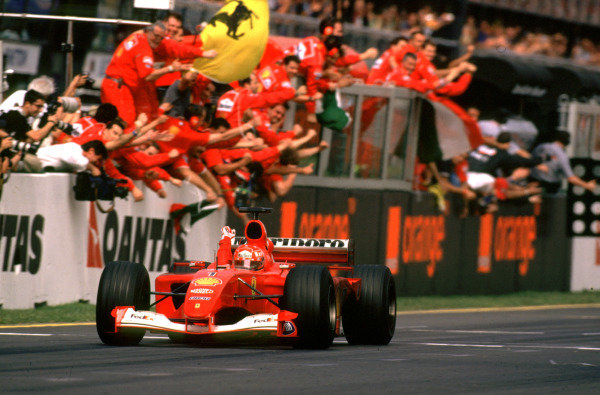 Australian Grand Prix.
Albert Park, Melbourne, Australia. 
2-4 March 2001.
The Ferrari team cheer as Michael Schumacher takes 1st position.
World Copyright - Steven Tee/LAT Photographic 
ref: 35mm Image Aus A01