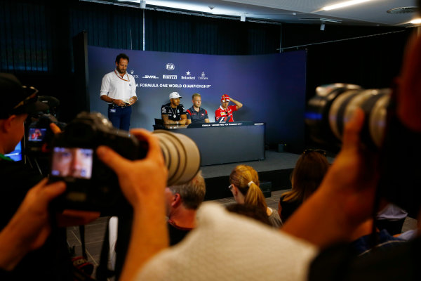 Red Bull Ring, Spielberg, Austria.
Thursday 06 July 2017.
Photographers take pictures of Lewis Hamilton, Mercedes AMG, Kevin Magnussen, Haas F1, and Sebastian Vettel, Ferrari, in the Thursday press conference.
World Copyright: Andy Hone/LAT Images
ref: Digital Image _ONZ8751