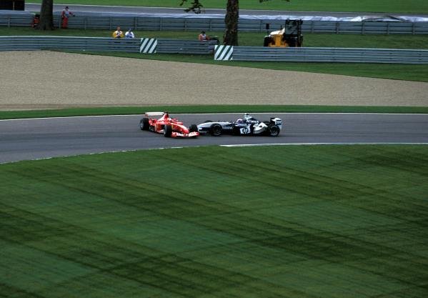 Juan Pablo Montoya (COL), BMW Williams FW25, and Rubens Barrichello (BRA), Ferrari F2003-GA, make contact on lap 3. Barrichello entered the gravel trap backwards and retired from the race while Montoya was handed a drive through penalty.
United States Grand Prix, Rd15, Indianapolis Motor Speedway, Indianapolis, USA. 28 September 2003.
BEST IMAGE Juan Pablo Montoya (COL), BMW Williams FW25, and Rubens Barrichello (BRA), Ferrari F2003-GA, make contact on lap 3. Barrichello entered the gravel trap backwards and retired from the race while Montoya was handed a drive through penalty.
United States Grand Prix, Rd15, Indianapolis Motor Speedway, Indianapolis, USA. 28 September 2003.
BEST IMAGE