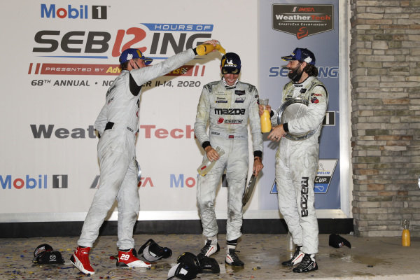 #55 Mazda Team Joest Mazda DPi, DPi: Jonathan Bomarito, Harry Tincknell, podium, champagne, orange juice