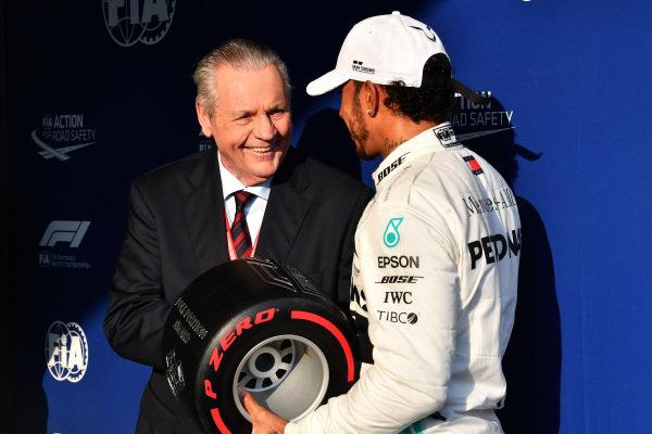 Lewis Hamilton, Mercedes AMG F1, receives the Pirelli Pole Position Award from former world champion Alan Jones